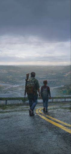 two people walking down the road with backpacks on