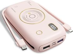 a pink cell phone is plugged into a charger