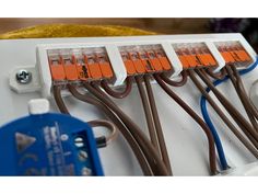 an electrical panel with multiple wires attached to it