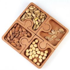 a wooden puzzle with nuts in it