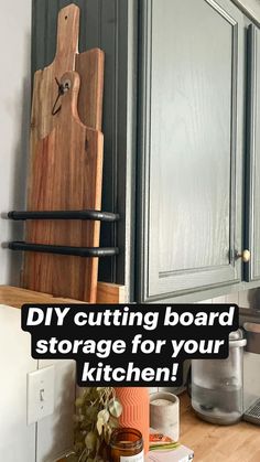 a cutting board sitting on top of a kitchen counter