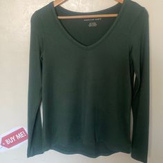 Very Soft Emerald Green V-Neck Sweater. Never Worn. No Tag. Excellent Condition. Measurements: Xs Bust- 34” Sleeve Length- 24” Length (Front) 23.5” (Back) 25” Long Sleeve Cotton V-neck Top For Fall, Fitted Cotton V-neck Sweater, Green V-neck Top For Fall, Green V-neck Top For Everyday, Casual Long Sleeve Stretch V-neck Top, Casual Stretch V-neck Top With Long Sleeves, Casual Long Sleeve V-neck Top For Fall, Casual Long Sleeve V-neck Top For Loungewear, V Neck Sweater