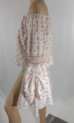 "Women's Top Long Flowy Sleeves Floral Pastel Roses Romantic Feminine size M Feminine Romantic Gorgeous! Handmade GORGEOUS top...one of a kind! Off the shoulder with cross over front, huge long drapey sleeves with pink crocheted lace trim and gather detail, 100% polished COTTON , small pink roses on white. STUNNING! LIKE NEW condition. High quality design, construction and materials. Easy to wear casual chic vintage for the disco sporting life. MEASUREMENTS: Length - 18\" Bust (underarms to unde Feminine Rose Print Blouse, Feminine Cotton Smock Top, Pink Feminine Smock Top, Cotton Stretch Floral Print Blouse, Pink Cotton Smock Blouse, Stretch Cotton Blouse With Floral Print, Fitted Pink Cottagecore Top, Pink Fitted Cottagecore Top, Stretch Cotton Blouse With Lace Trim