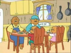 an animated image of two people sitting at a table with teddy bears in front of them