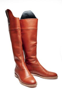 Handmade tall cognac brown boots equestrian-inspired and handcrafted of finest Italian leather fro top to bottom. With high Spanish-cut topline, black pull up strap and zip fastening along back make them easy to put on and off. We like them styled with skinny jeans, sleek leggings or an oversized sweater dress amd skirts. Full leather outer, interior and sole. DETAILS: Full leather upper, lining and sole Heel measures approximately 25mm/ 1 inch High Spanish-cut topline Black pull up stripe Almon Classic Brown Knee-high Riding Boots, Classic Brown Knee-high Boots For Riding, Brown Wide Calf Knee-high Boots For Riding, Brown Winter Riding Knee-high Boots, Yellow Ankle Boots, Oversized Sweater Dress, Brown Leather Riding Boots, Leather Thigh High Boots, Boots Knee High