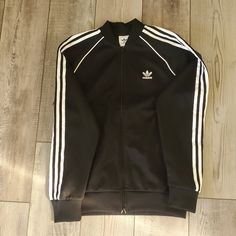 For Sale: Adidas Adicolor Classics Sst Track Jacket (Size M, Black) Brand New, No Tags Black With Signature White Stripes Medium Size Full Zip-Up With Two Pockets Original Price: $89 Cash Only, Please Smoke And Pet-Free Home Adidas Adicolor, Track Jacket, White Sweaters, Track Jackets, Black Adidas, Zip Up, Adidas Women, Medium Size, White Stripe