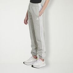 Weekends to whenever, she'll be comfortable in these girls' joggers. Silky soft fleece feels cozy and warm. adidas 3-Stripes come standard because of course they do.Front Style: Flat FrontFeatures: Drawstring WaistClosure Type: Full ElasticFit: Regular FitPockets: 2 Side Slip PocketsRise: Mid RiseFiber Content: 70% Cotton, 30% PolyesterFabric Description: FleeceInseam: 24 InLeg Style: Cuffed LegCare: Tumble Dry, Machine WashCountry of Origin: Imported Pants Jogger, Girls Joggers, Kids Jogger, Cuffed Joggers, Fleece Joggers, These Girls, Jogger Pants, Drawstring Waist, Mid Rise