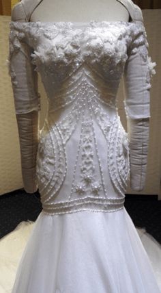 the back of a wedding dress on display