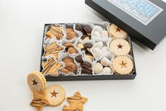 Christmas Cookies  | Vienna Cookie Company Crispy Butter Cookies, Viennese Cookies, Holiday Cookie Gift, Chocolate Hazelnut Cookies, Homemade Raspberry Jam, Crescent Cookies, Spiced Almonds, New Years Cookies, Hazelnut Cookies