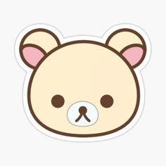 a sticker with a brown bear face on it's side and pink ears