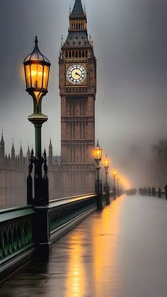 the big ben clock tower towering over the city of london on a foggy day