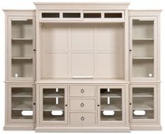 a white entertainment center with glass doors and shelves on each side, in front of a white background