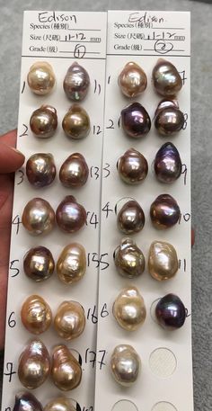 two rows of different types of pearls are shown in this image, one is brown and the other is white