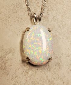 "Large White Lab Created Opal 15x20mm Full Of Rainbow Fire-See Video! There Is More Pink Than Photos Show. Sleek 925 Sterling Silver Pendant With Choice Of Setting Styles, Split Bail, OR Single Dangle (Choose In Drowndown)18\" Sterling Chain Several Chain Length Options to Choose, Message Seller For Availability Of Your Choice. Great Gift! Gift Box Included * I Have An Even Larger One Too! https://www.etsy.com/Cloudrivercreations/listing/1303871722/huge-white-opal-necklace-18x25mm" Classic Multicolor Jewelry For Gifting, Classic Multicolor Jewelry For Gift, Classic Multicolor Jewelry Gift, White Oval Necklace With Polished Finish, Sterling Silver White Cabochon Necklace, White Cabochon Sterling Silver Necklace, White Oval Cabochon Necklace, White Oval Pendant Jewelry Stamped 925, Oval White Necklace Stamped 925