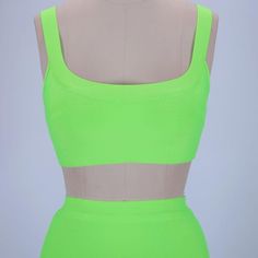 Update your wardrobe with this gorgeous Neon Green 2 Piece Bandage Crop Top and Midi Skirt. Featuring an elegant round neck crop top and a classy bandage matching skirt, perfect for the office or occasional wearing. Team with high heels and a clutch bag. Features: Round Neckline Two-Piece Set Comfortable Fit Fits True To Size Cropped Top Sku: 1649 Made from the best quality bandage material. Crop Top And Midi Skirt, Bandage Crop Top, Round Neck Crop Top, Update Your Wardrobe, Neck Crop Top, Cropped Top, Neon Green, Round Neckline, Athletic Tank Tops