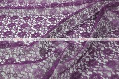 purple lace fabric with flowers on it