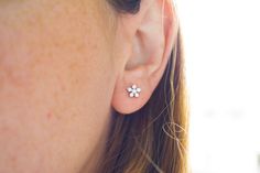 Lots of sparkle in these .925 sterling silver flower studs Flower shaped Very delicate sterling silver stud earrings, perfect as a second hole earring Fast shipping Care instructions: keep away from water/perfumes, buff with a felt fabric Sterling Silver Midi Rings, Flower Earrings Silver, Second Hole Earrings, Tiny Cross Necklace, Evil Eye Necklace Gold, Silver Flower Earrings, Sterling Silver Flowers, Jewelry Unique, Evil Eye Necklace