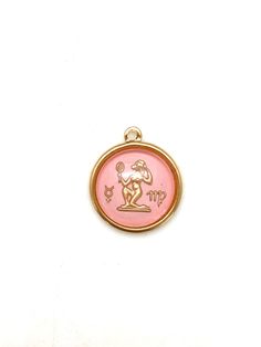 Beautiful pink zodiac vintage charms! These adorable vintage zodiac charms are from the 1970's, with this one being a Virgo. Made in Germany of glass. I take these vintage charms and strip the original color and repaint them in this gorgeous cute baby pink color. Then I glue them onto a vintage gold-plated brass backing. I put these on a beautiful 16 or 18 inch gold filled satellite chain.     All 12 signs available.   These make a great gifts! These are a unique and special necklace that you will have for a lifetime!   Select your sign and choose your chain length! There is also a story behind these pieces.  I live in Los Angeles and 20 years ago helped gather some vintage pieces for the movie Almost Famous.  This piece caught the eye of the costume designer and some of these were purchas Nickel-free Pink Pendant Charm Necklace, Nickel Free Pink Pendant Charm Necklace, Pink Nickel-free Pendant Charm Necklace, Personalized Vintage Pink Jewelry, Vintage Pink Charm Jewelry, Vintage Pink Jewelry With Charms, Pink Vintage Jewelry With Charms, Vintage Zodiac, Baby Pink Color