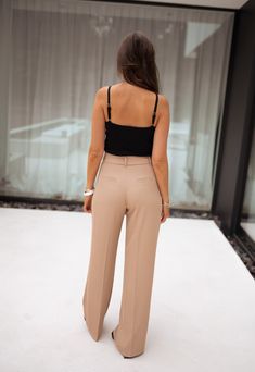 Pleated pants Belt loops Two pockets on the sides Two fake pockets on the back Fastener and zipper Sizes : S - M - L S : Length 42 inches - Width 13.4 inches M : Length 42.9 inches - Width 14.2 inches L : Length 43.7 inches - Width 15 inches Marine is 5'6, Ophélie is 5'6 and both wear a size S Contexture : 96% polyester / 4% spandex Handwash only Straight Pants With Zipper Closure For Work, Straight Work Pants With Zipper Closure, Night Out High-waisted Pants With Pockets, High-waisted Pants With Pockets For Night Out, Chic Wide Leg Bottoms With Zipper Closure, Workwear Trousers With Zipper Closure, Night Out Tapered Leg Pants With Belt Loops, Chic Wide Leg Pants With Zipper Closure, Tapered Leg Pants With Belt Loops For Night Out