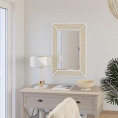 a living room with a white chair and mirror on the wall next to a potted plant