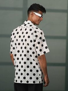 SHVAAS By VASTRAMAY Men's White And Black Polka Dot Print Cotton Shirt Add a touch of timeless style to your wardrobe with this classic polka dot shirt. Crafted from pure cotton for breathable comfort, it features a notched collar, front button placket, half sleeves, and a regular fit. Features Notched collar Front button placket Half sleeves Regular fit Black and white polka dot print Specifications Material: 100% Cotton Sleeve Length: Half Material & Care Machine washable Dry clean recommended Collared Cotton Polka Dot Tops, Polka Dot Collared Cotton Top, Collared Polka Dot Cotton Top, Polka Dot Cotton Collared Top, Casual Polka Dot Button-up Shirt, Casual Polka Dot Shirt, Polka Dot Summer Shirt With Buttons, Summer Collared Polka Dot Shirt, Summer Polka Dot Collared Shirt