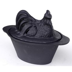 a black hat that is shaped like a chicken