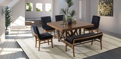 a dining room table with black chairs and a potted plant