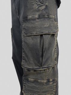 Experience the fusion of functionality and trendsetting design with the Multi Pockets Gradient Jeans. This denim cargo masterpiece boasts a rich washed dark blue hue, contrasted beautifully by the edgy acid wash distressing on the sides. The jeans' most striking feature, two large pockets on both sides, serve a dual purpose - making a bold visual statement while adding practical utility. Further enhancing the uniqueness of these jeans, the waist pockets have been crafted with a multi-layer splic Grunge Denim Blue Cargo Jeans, Dark Wash Denim Cargo Jeans In Grunge Style, Grunge Style Dark Wash Straight Leg Cargo Jeans, Dark Wash Grunge Cargo Jeans, Utility Jeans With Multiple Pockets In Washed Blue, Washed Black Denim Cargo Bottoms, Distressed Medium Wash Cargo Jeans, Grunge Denim Cargo Pants For Streetwear, Casual Distressed Denim Blue Cargo Pants