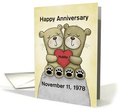 an anniversary card with two teddy bears holding a heart