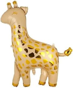 an inflatable giraffe is shown with gold spots on it's body