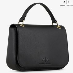 fashion black flap handbag Brand: Armani Exchange Elegant handbag with flap for women, signed Armani Exchange, in a classic minimal style. Top single handle, detachable crossbody shoulder strap. Inside: unlined, black; open pocket. Closure: front flap with magnetic button. Dimensions: 25.5 x 7 cm, H. 18 cm. Designer: fashion company Giorgio Armani. Line: AX Armani Exchange (the second line by Armani).   Material: polyester with polyurethane coating Color: black 00020 DELIVERY TIME: TO KNOW THE ACCURATE SHIPPING TIME PLEASE CONTACT ME borsa a mano con patta, nera Marchio: Armani Exchange Elegante borsa a mano con patta da donna, firmata Armani Exchange, in uno stile classico minimal. Manico singolo superiore, tracolla staccabile. Interno: sfoderato, nero; tasca aperta. Chiusura: patta front Armani Bag, Giorgio Armani Bag, Armani La Prima Bag, Giorgio Armani La Prima Bag, Armani Exchange Bag, Branded Handbags, Armani Exchange, Black Women Fashion, Fashion Company