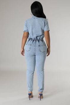 Make a statement in this light blue denim jumpsuit that features a flattering fitted waist to hug your curves. With short sleeves, self-tie strings and classic denim style, you'll be sure to stand out in any crowd while elevating your wardrobe with this timeless and stylish look! Non-stretch jumpsuit Collar Short sleeve Elastic waistband Self-tie strings Button closure 6 Pockets Inseam is 26 inches 50% Polyester 50% Cotton Hand wash cold Model is wearing a medium MODEL STATS Height: 5.3"Bust:33" / Waist:28" / Hips:42" Mens Designer Hoodies, Trendy Jumpsuit, Stretch Jumpsuit, Denim Patterns, Denim Gift, Footwear Design Women, Designer Shorts, Washed Denim, Light Blue Denim