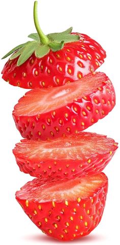 sliced strawberries are stacked on top of each other, with the stems still attached