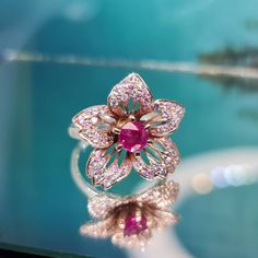 Pink Lab-created Ruby Ring With Brilliant Cut, Pink Brilliant Cut Lab-created Ruby Ring, Pink Lab-created Ruby Ring, Pink Ruby Ring With Rose Cut Diamonds, Elegant Red Pink Sapphire Ring, Elegant Red Sapphire Ring, Flower Shaped Ruby Ring As A Gift, Flower Shaped Ruby Gemstone Rings, Pink Ruby Flower-shaped Jewelry