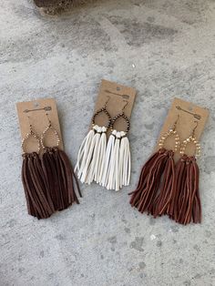 Elegant Brown Adjustable Tassel Earrings, Elegant Brown Dangle Tassel Earrings, Brown Fringed Tassel Earrings Gift, Brown Fringe Tassel Earrings For Gift, Brown Fringe Tassel Earrings As Gift, Brown Dangle Earrings With Tassels, Elegant Leather Fringe Jewelry, Brown Fringe Tassel Dangle Earrings, Brown Fringe Dangle Tassel Earrings