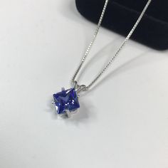 "Beautiful Trillion Tanzanite* & Sterling Silver Pendant Necklace * 2ct Princess Cut Tanzanite* measures 8mm * Solid Sterling Silver * 16\" or 18\" Sterling Silver Chain included-select your length Hallmarked & Gift Ready! Matching Ring available here https://www.etsy.com/listing/511156028/gorgeous-25ct-princess-cut-tanzanite Matching Earrings Also Available! *Tanzanite is one of very few gemstones that cannot be grown in a Lab, however, these Laboratory Grown Simulate Stones are optical Elegant Tanzanite Necklace Gift, Tanzanite Gemstone Pendant Necklaces, Tanzanite Faceted Necklace For Gift, Silver Tanzanite Pendant Jewelry, Luxury Tanzanite Pendant Necklace, Tanzanite Pendant, Tanzanite Necklace, Tanzanite Jewelry, Fine Art Jewelry