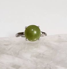 Jade can help you feel beauty, bestow luck, and bring joy.  This is Nephrite Jade, 10mm round cabochons. Nephrite Jade, Small Rings, Blue Zircon, Solitaire Ring, Sterling Silver Ring, Silver Ring, Sterling Silver Rings, Jade, Jewelry Rings