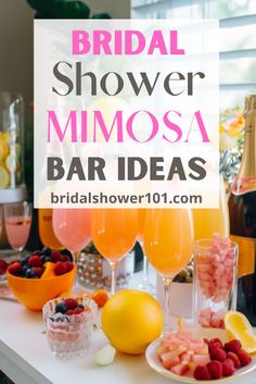 the bridal shower mimosa bar is filled with fruit, champagne and wine