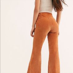 Nwt Free People Honey/Brown Corduroy Flare Pants With Raw Hem. New With Orig. Tags Note: 2 Ink Spots On The Back Upper Waist But Small. See Photos Sizing: Price Tag Says Size 35 And Inside Tag Says 32, But I Think It's A Typo On The Price Tag. I Am 5'4", A Size 14 With A 36" Waist And 45" Hip Size And They Fit Me But Are Just A 'Bit' Bigger Than My Size So They Can Fit Anyone Between 14-16 Item Has No Issues Unless Otherwise Stated. Reposhing Due To Sizing/Fit On Me Orange Cotton Pants For Fall, Trendy Orange Pants For Fall, Casual Orange Flare Pants, Casual Orange Pants For Fall, Retro Full Length Orange Bottoms, Retro Orange Full-length Bottoms, High Waist Orange Bottoms For Fall, Casual Orange Flare Bottoms, Casual Mid-rise Orange Bottoms