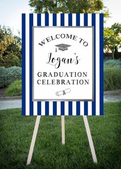 a sign that reads, welcome to legan's graduation celebration with a blue and white striped frame