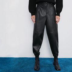 Zara Black Faux Leather Joggers. Jogger Style Pants In A Sleek Smooth Black Faux Leather. Features Faux Leather Scrunched Ankle Cuffs, Super Deep Large Side Pockets. High Waisted. Brand New With Tags! Marked As A 00 But They Have Very Oversized And Would Fit Best As A Size Small (Please Double Check Measurements To Make Sure) Measurements 14” Waist 36” Long 24” Inseam Zara Leather Joggers, Black High-waisted Leather Pants For Streetwear, High Waist Leather Bottoms For Streetwear, High-waisted Leather Pants For Streetwear, Chic Winter Streetwear Bottoms, Black Faux Leather Winter Pants, Winter Black Faux Leather Pants, Chic Winter Streetwear Pants, Faux Leather Pants For Streetwear In Fall