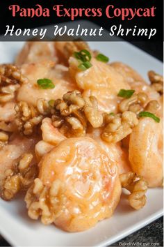 a white plate topped with honey walnut shrimp