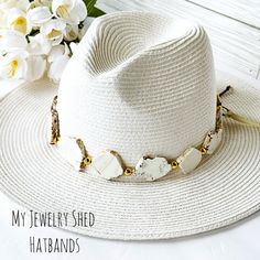 Looking to add some glamour to your hat? This beautiful, hand beaded hat band is fully adjustable for a custom fit for your hat. Made with gorgeous slices of Imperial Jasper gemstone in off white and accented with gold bead spacers!   Suede cording added to back for adjustability. Perfect for added style to your hat!!  It looks great on a cowboy hat or straw hat. Great for a country wedding, too! Hat and props NOT included. Used only for photography purposes.  LISTING IS FOR HATBAND ONLY!! HAT N Luxury Adjustable Hat Bands For Spring, Luxury Hat Bands With Flat Crown For Formal Occasions, Pearl Hat Band, White Jasper, A Country Wedding, Beaded Hat Bands, Hat Bands, Beaded Hat, Imperial Jasper