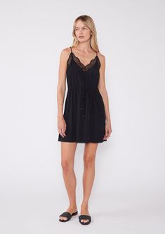 [Color: Black] Cute little black mini dress featuring a lace v neckline Black V-neck Slip Dress With Lace Trim, Black Slip Dress With Lace Bodice, Chic Black Slip Dress With Contrast Lace, Black Spaghetti Strap Dress With Delicate Lace, V-neck Slip Dress With Lace Trim For Date Night, V-neck Lace Trim Slip Dress For Date Night, Black V-neck Dress With Contrast Lace, Elegant Black Slip Dress With Delicate Lace, Chic Black Dress With Delicate Lace