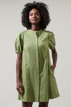 Look cute and casual wherever you go with the Yami Button Down Shift Mini Dress! Soft fabric shapes pleated short puff sleeves that end in an elastic cuff. A button-front silhouette, with belt around the waist, stops a flirty mini hem. Pair with anything from sneakers to strappy sandals for a sweet OOTD!- Belted- Button up- Short puff sleeves- Shift dress- Comes in 2 colorsSize + Fit - Model is 5'8" and wearing size XS- Measurements taken from size S - Chest: 19"- Length: 34" Fabric Self:85%Cott Shift Mini Dress, Camisole Bra, Wrap Jumpsuit, Bra Dress, Body Dress, Pleated Shorts, Curve Dresses, Mini Shift Dress, Skirt Leggings