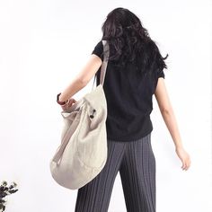 Unique design women large bag women canvas backpack canvas shoulder bag. Casual Duffle Bag Backpack For On-the-go, Beige Cotton Hobo Bag For Travel, Cotton Beige Backpack Style Shoulder Bag, Beige Cotton Backpack Style Shoulder Bag, Beige Canvas Hobo Bag For School, Beige Cotton Backpack Shoulder Bag, Trendy Cotton Backpack, Large Canvas School Duffle Bag, Casual Beige Weekender Bag With Adjustable Strap