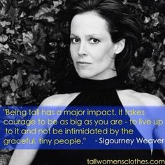 a woman in a black dress with a blue background and quote about being tall as a major impact it takes