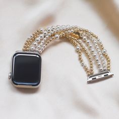 Mix of gold-filled and silver beaded elastic apple watch band Watch band piece available in silver, rose gold or black Available for 38/40/41mm or 42/44/45mm Available in four sizes XS/Small: approximately 6.5 inches Small/Medium: approximately 7 inches Medium/Large: approximately 7.5 inches Large/X-Large: approximately 85 inches Buy 1 Get 1, Apple Watch Band, Silver Rose Gold, Buy 1, Apple Watch Bands, Watch Band, Silver Beads, Watch Bands, Apple Watch