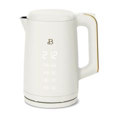 a white electric tea kettle with the number 51 on it's side and gold trimmings