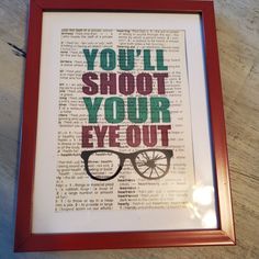 a framed book page with the words you'll shoot your eye out on it